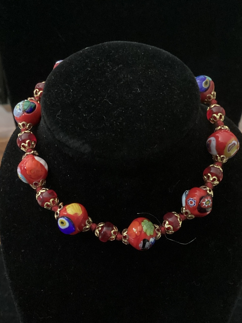 Red Millefiori Glass Bead Bracelet with Gold Accents